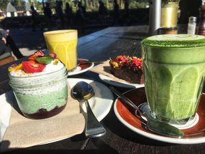 Chia pudding, chocolate cake, turmeric and matcha latte at Vudu Cafe and Larder in Queenstown