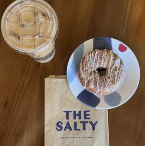 Vegan cinnamon sugar donut, iced decaf latte with oat milk (extra charge) at The Salty in Charlotte