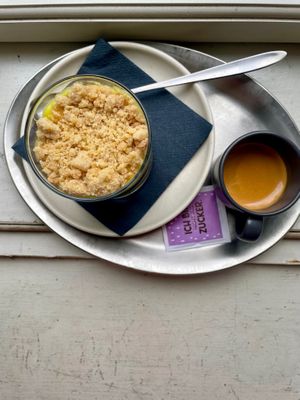pudding crumble with bourbon vanilla & plums, cookie dow & oat crumble on top at Von Zehn bis Vier at Academy Bar in Salzburg