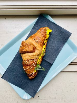 quinoa croissant with vegan egg spread at Von Zehn bis Vier at Academy Bar in Salzburg