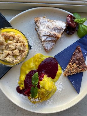 you can‘t decide? take a small piece of all daily sweets :) at Von Zehn bis Vier at Academy Bar in Salzburg