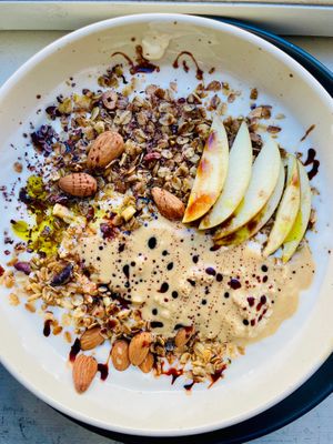 granola with hempseeds, cacao nips, nuts & skyr. optional with berry cream or pomegranade molasse at Von Zehn bis Vier at Academy Bar in Salzburg