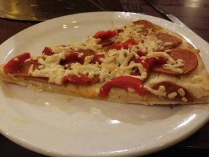 vegan pizza with vegan pepperoni and red peppers  at Poppy's Pizza and Grill in Estes Park