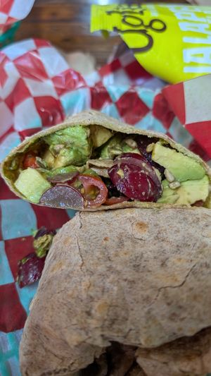 Green Arrow wrap - avocado, grapes, cherry tomatoes, and vegan pesto at Nozzo Pazzo in Vienna