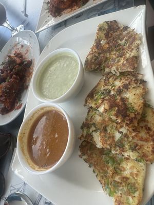 Veg uttapam with gobi Manchurian in the background   at The Point Hotel & Spa in Mossel Bay