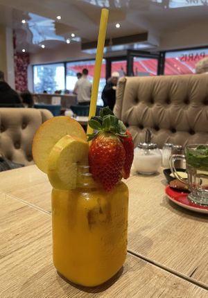 Mango, orange and pineapple smoothie - Café Paris, Euskirchen  at Café Paris  in Euskirchen