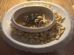 Morel Mushrooms / Onion Essence /
Smoked Hazelnuts  at Fronda Pasaje BCN in Barcelona