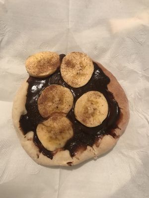 esfiha de banana com canela e ganache  at Loving Hut - Vila Mariana in Sao Paulo