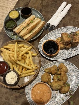(Top left to bottom right) Bread and Dips, Crispy Tofu, Fries (mayo not vegan), Vegan Popcorn Chicken  at The Shack Restaurant and Bar in 