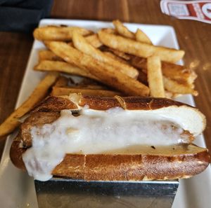 Beyond Vegan Brat (with vegan cheese but no vegan slaw because they were out). Brat was good. Fries were excellent. BBQ Sauce is not vegan here (they add milk stout to it). at DTW - Atwater Brewery - Gate D24, Concourse D in Detroit
