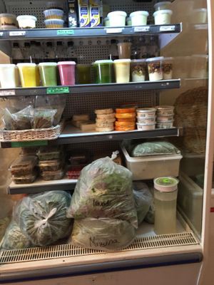 Fridge with ready vegetable drinks and other cold produce. at Mercado Verde in Punta Del Este