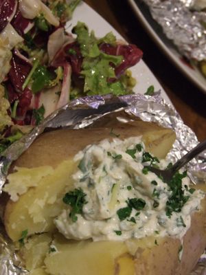 Baked potato with sour creme (vegan) at Vengo Die Gemusekuche in Bremen