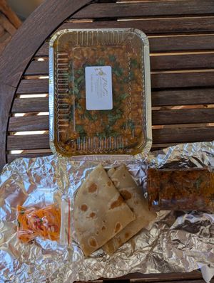 Meal including a bottle of Melanie's chilis
Yummm at MelG's Kitchen  in Bloemfontein