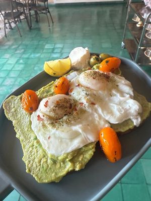 Avocado toast with poached egg at Falafel Terrace & Brunch in Marrakech