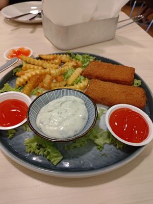 Expensive and small portion size fish and chips, completely different from the menu photo at Gokul Raas Vegetarian - Little India in Central Singapore