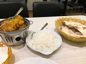 Aloo gobi, basmati rice and plain naan at Gokul Raas Vegetarian - Little India in Central Singapore