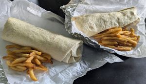 The fries pictured are all from one order of fries. The wraps are like the size of a forearm! at Vida Verde in Johnstown