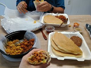 Shared Pancake Platter + tofu scramble and Buffalo ChiXen Wrap at Vida Verde in Johnstown