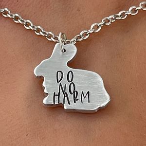 Do No Harm Mini Rabbit necklace
Details:Shown in recycled aluminum

measures approx. just under 3/4" x 3/4" comes with 2.5 mm silver-plated flat  at TERRATAVIDA - Pop-Up in Temple