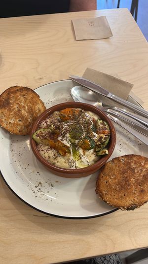 Warm hummous, g/f toast. Delicious  at Black Cat Santiago in Santiago De Compostela