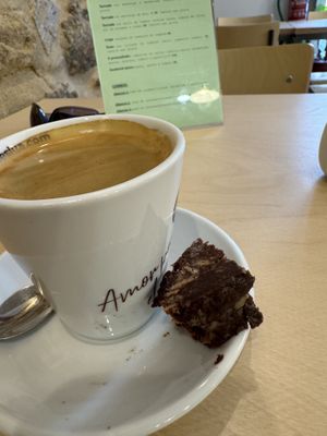 Coffee came with free chocolate salami   at Black Cat Santiago in Santiago De Compostela