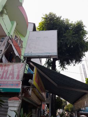 Outside faded signs #Veganuary at Tâm Phước Buffet Chay in Ho Chi Minh City