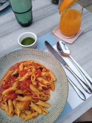 Vegan Penne Pomodoro pasta and basil pesto. Cold pressed orange juice. #Veganuary at CRU Kitchen & Bar in Ao Nang