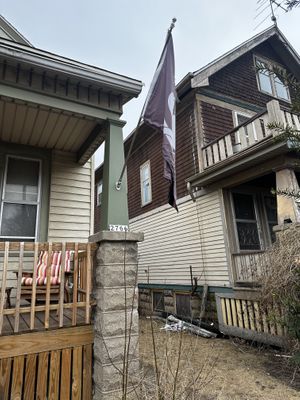 Just look for this flag and find the house for pick up  at HoochMKE in Milwaukee