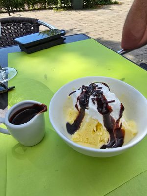 Coconut icecream with whip and chocolate sauce at Dorpshuis D'n Ostpit in Zeeland