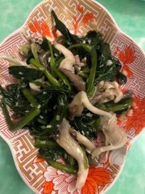 Oyster mushrooms and spinach at Café China - 傾國傾城 in New York City