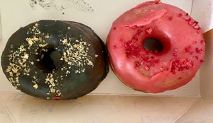 Black sesame, raspberry  at Doce Donut Co  in Seattle