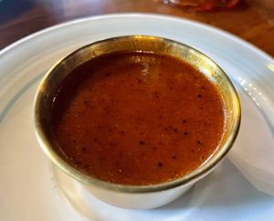 Grammy’s warm tomato, bacun dressing.  at Marian Cocktails and Kitchen in Raleigh