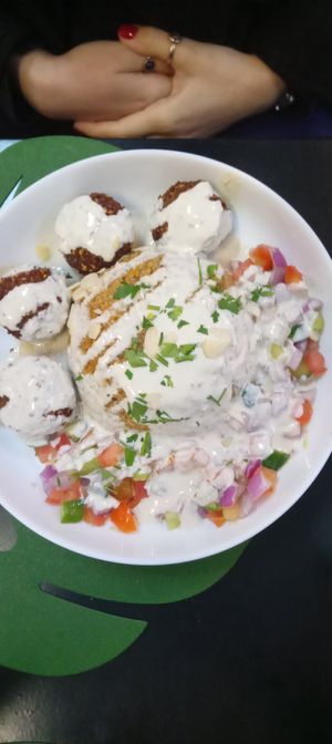 "Couscous de quinoa" (acompanha bolinhos fe falafel, saladinha de tomate, pepino e cebola roxa regados com muito tahine) at Haya Falafel Café - Pinheiros in Sao Paulo