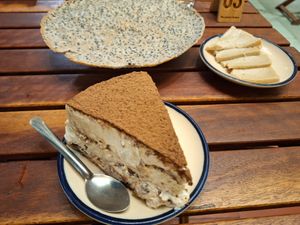 Tiramisu and behind the cracker with cheese on the right at Chickpea Eatery in Da Nang
