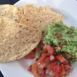 Guac and pico  at Johnny Mango World Cafe and Bar in Cleveland