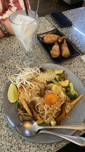 Pad thai with vegan duck, coconut juice and drumsticks  at Peace Harmony in Sydney
