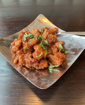 Gobi Manchurian appetizer.  Crunchy cauliflower in the chef's special sauce. I ordered it with the "Extra Hot" spice level which is "Indian Hot". Loved it. at Saffron Indian Grill & Bar in Eagan