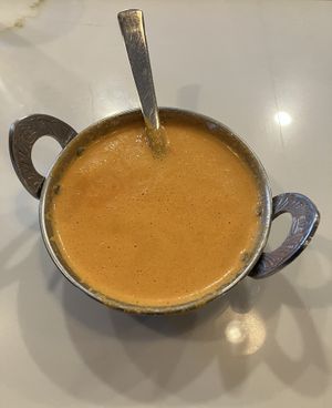 Coconut Bell Pepper Soup (roasted bell pepper with coconut cream). Thick & creamy with notes of warming spices. at Saffron Indian Grill & Bar in Eagan