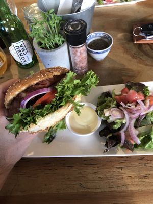 The Salmon burger is absolutely DELICIOUS! at Plant in Cape Town