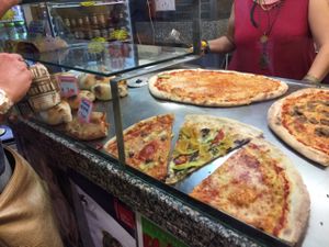 Pizza veg and non-veg on right, more veg on left. at Pizzeria L'Angelo in Venice
