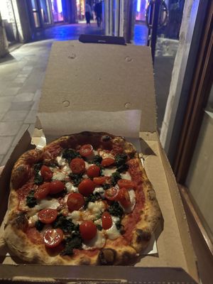 Alfa (vegan cheese, cherry tomatoes, tomato sauce, & spinach subbed for arugula)  at Pizzeria L'Angelo in Venice