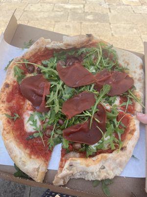 Vegan prosciutto, vegan cheese, olives, and arugula   at Pizzeria L'Angelo in Venice