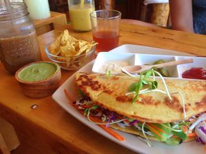 tofu scramble in gluten free wrap with a side of pesto at Eat.Co Brunchrie in Koh Phangan