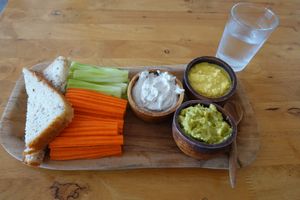 Guac, hummus and cheese dips with bread, cucumbersticks and carrotsticks. at Eat.Co Brunchrie in Koh Phangan