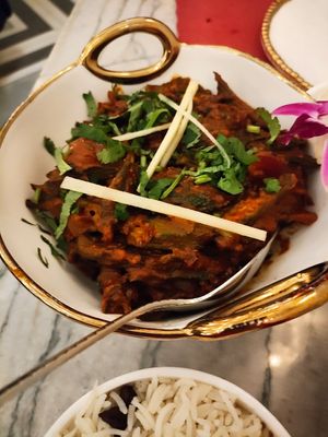 My partner loves okra, ordered Bhindi Masala entree spicy comes with rice, he was happy but couldn't finish portions are huge! at Red Chilli  in Jackson Heights