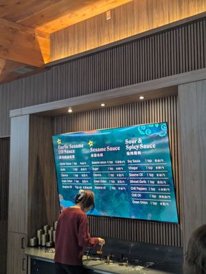 Make your own sauce/ toppings bar at Souper Hot Pot in Toronto