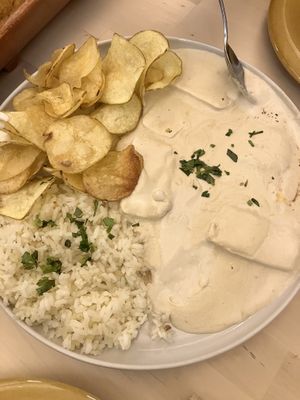 Tofu con salsa, arroz y patatas  at Golden Hour Restaurante in Elvas