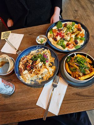 Baba ganoush, hummus, batata harra, toom at Tawook Lab in Helsinki