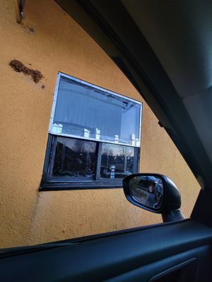 Blacked out window, truly discount paint with spray foam accent. at Sakura Steak House in Christiansburg