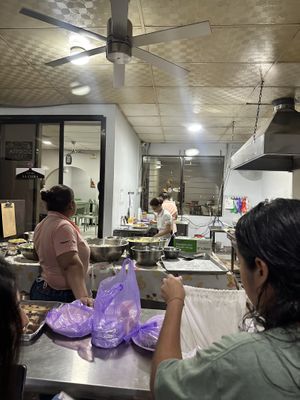 Kitchen and order counter  at Pupusería La Ceiba in Santa Ana